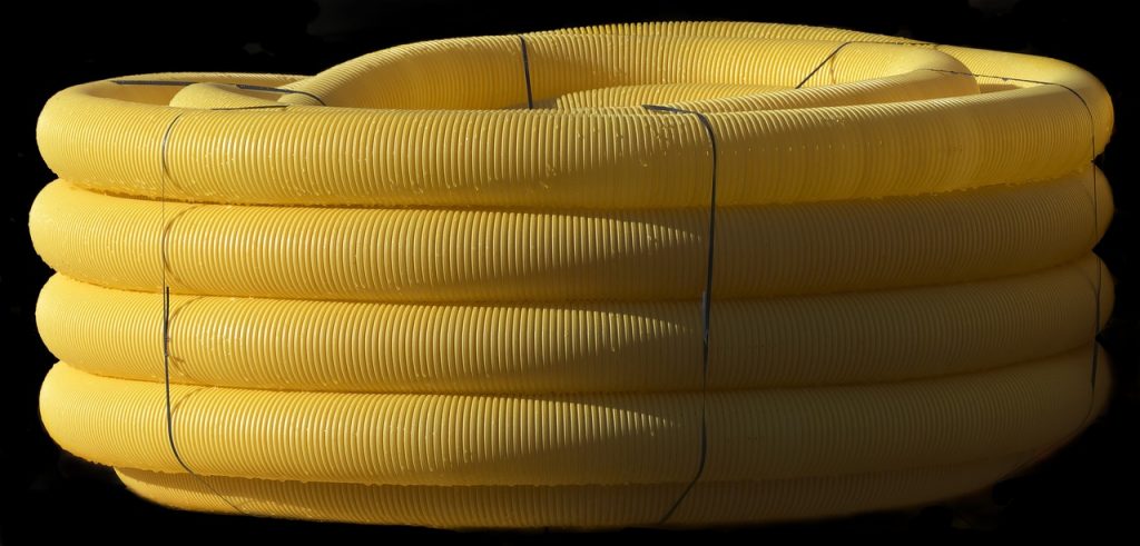 drain pipe, flexible, wound up, role, pvc, drainage pipe, drainage, tube, wrapped, plastic, yellow, construction site, pvc, pvc, pvc, pvc, pvc, drainage, drainage, drainage